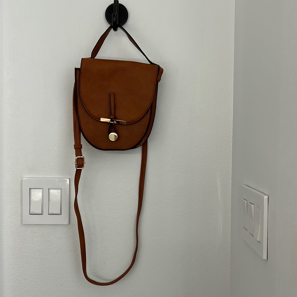 NEVER BEEN USED tan purse with three interior card slots